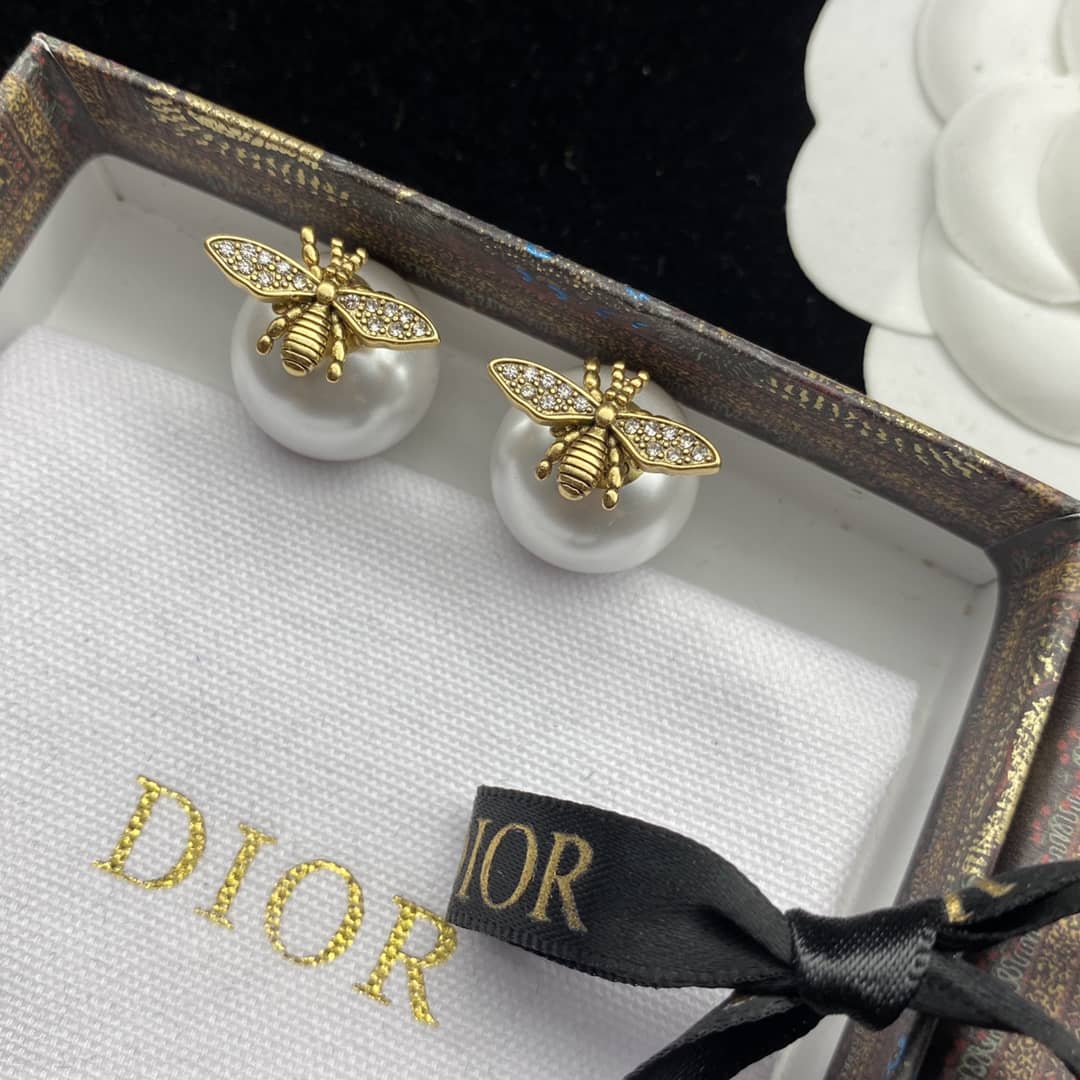 7 Star Chr1st1an D10r Earring